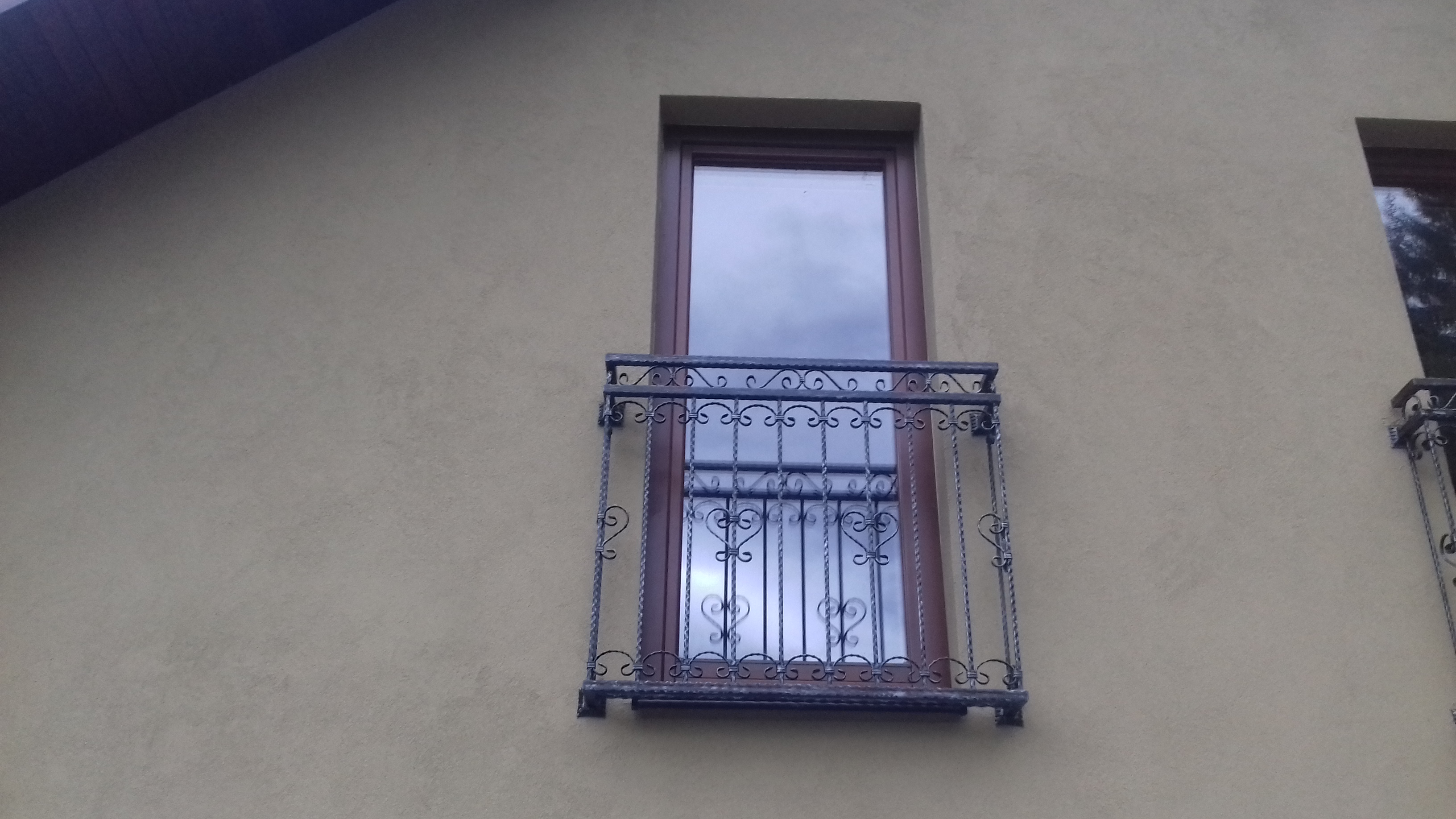 Kované zábradlí na francouzská okna